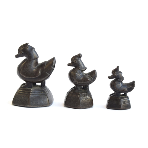 173 - Three 19th century Burmese bronze opium weights in the form of hintha birds, the tallest 6.4cm high