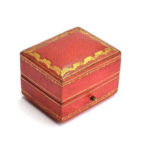 42 - An early 20th century Cartier double ring box, red leather and gilt tooled exterior, with peach velv... 