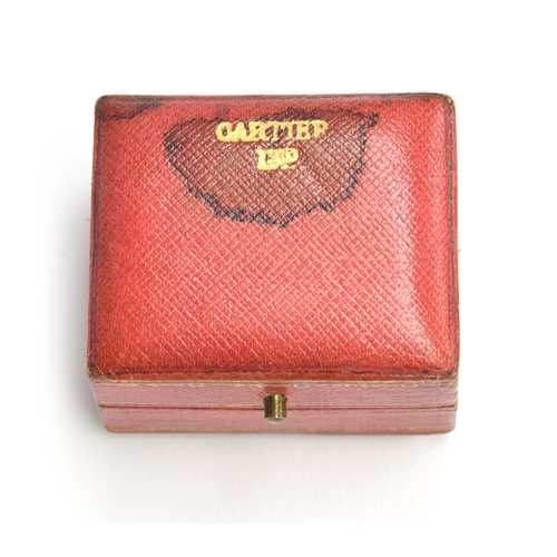 42 - An early 20th century Cartier double ring box, red leather and gilt tooled exterior, with peach velv... 