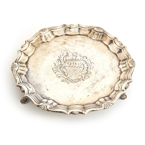 118 - A small George II silver salver by Robert Abercromby, London 1743, engraved with central crest withi... 