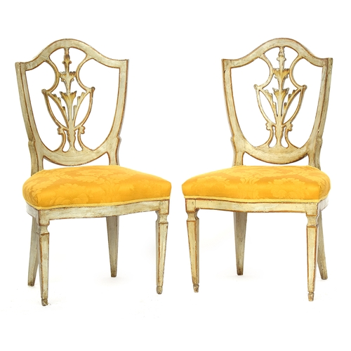 683 - A pair of 19th century Italian painted shield back side chairs, shaped stuffover seats, on square ta... 