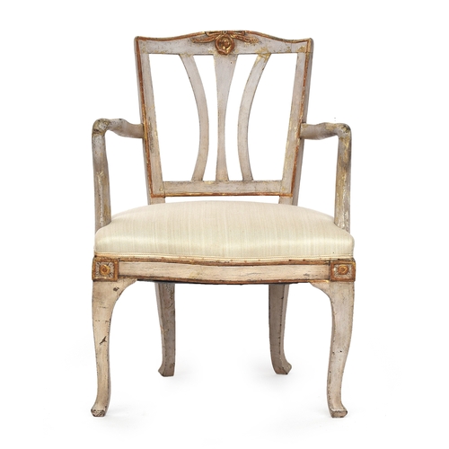 684 - An Italian painted and parcel gilt elbow chair, rail with central gilt cartouche, serpentine stuffov... 