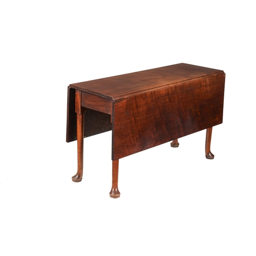 598 - A George II mahogany drop leaf table, circa 1750, the drop leaf top above turned supports and 
pad f... 