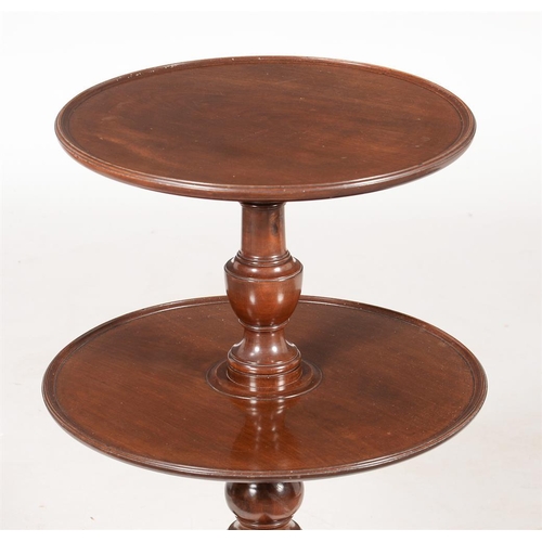 592 - A George III mahogany two tier dumb waiter, circa 1780, 82cm high, 52cm diameter