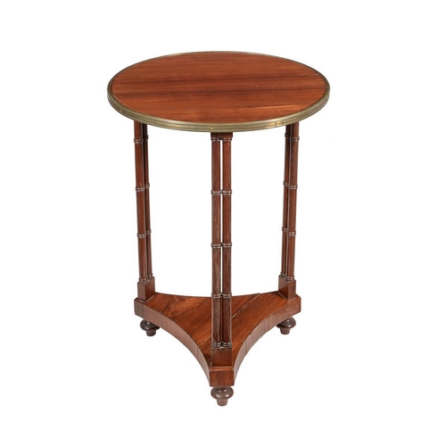 647 - A hardwood and brass bound occasional table, circa 1820 and later, the circular top above columnar s... 