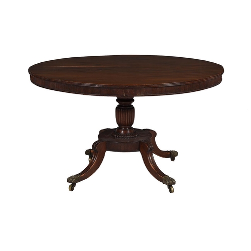 638 - A George IV mahogany centre table, circa 1825, the circular top with reeded edge and frieze, 73cm hi... 