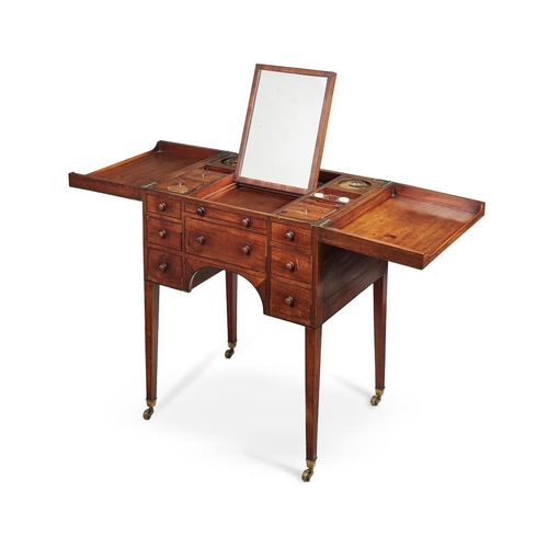 627 - A George III mahogany and ebony strung dressing table, late 18th century, of campaign type, the hing... 