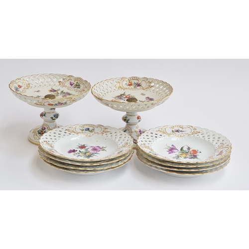 237 - Two porcelain hand painted tazza dishes with floral spray design and pierced rims, 14cm high, togeth... 