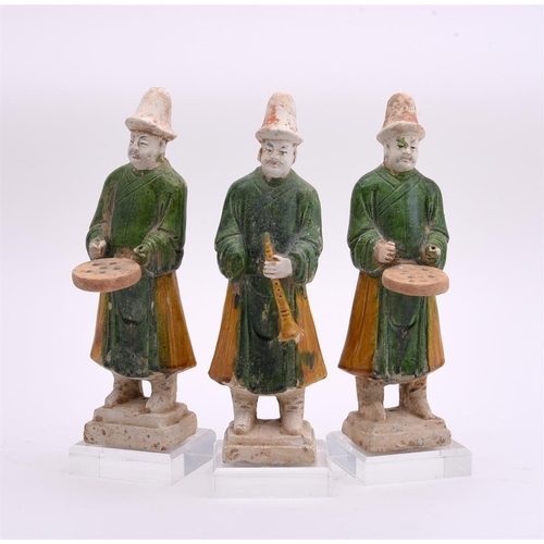 187 - Three Chinese Tang style Sancai figures of musicians, Ming Dynasty or later, 24cm high, together wit... 