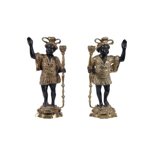 146 - A pair of brass and patinated models of 'Blackamoors', early 20th century, as candlesticks, 39cm hig... 