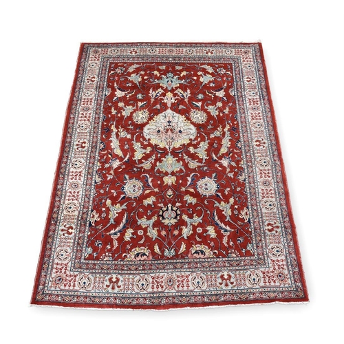 741 - An Isfahan carpet, approximately 326 x 220cm