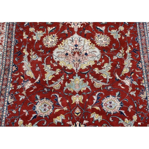 741 - An Isfahan carpet, approximately 326 x 220cm