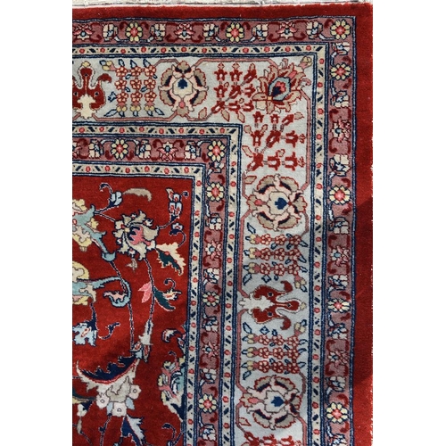 741 - An Isfahan carpet, approximately 326 x 220cm