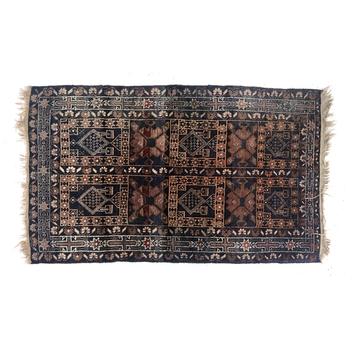 731 - An asymmetric blue ground Persian tribal rug, 151x90cm