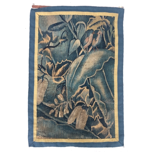 735 - A small piece of verdure tapestry, with two songbirds, 60x89cm

Provenance: part of the contents of ... 