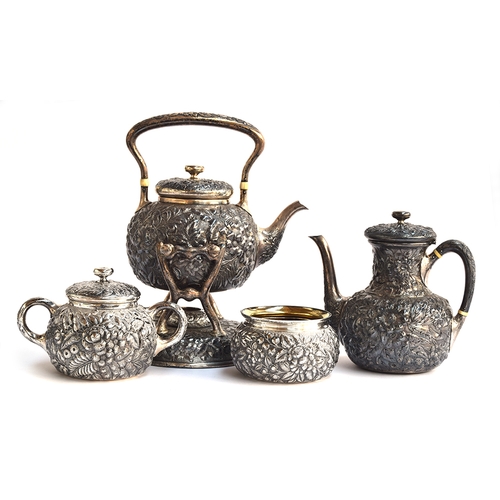 102 - A Whiting Manufacturing Co four piece American sterling silver tea set, comprising teapot on stand w... 