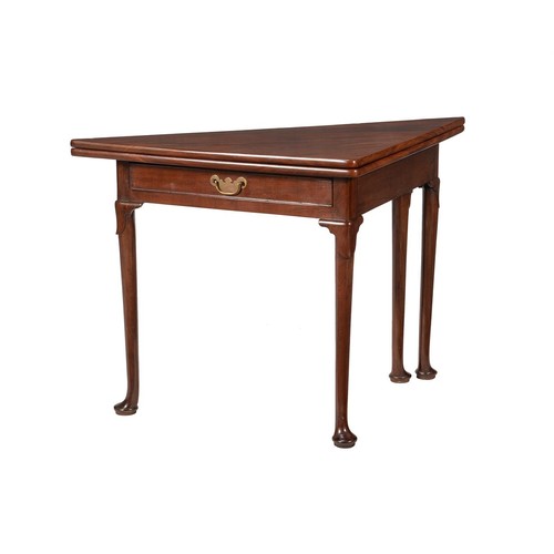 600 - A George II mahogany triangular folding tea table, circa 1740, 70cm high, 106.5cm wide, 
53cm deep