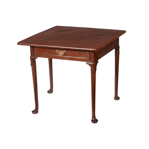 600 - A George II mahogany triangular folding tea table, circa 1740, 70cm high, 106.5cm wide, 
53cm deep