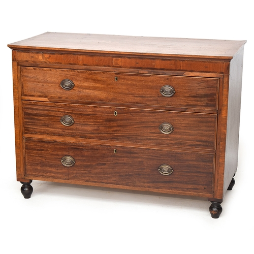 586 - A French mahogany and cross banded commode chest of three drawers, c.1800, the frieze with secret dr... 