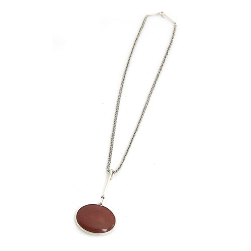 45 - Vivianna Torun Bülow-Hübe for Georg Jensen, a scarce silver and polished red agate cabochon pendant,... 