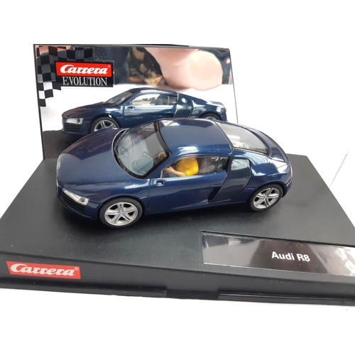 120 - A Carrera Revolution Audi R8, boxed, together with an Aston Martin V12 Vanquish, boxed