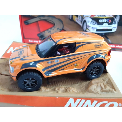 121 - A Ninco Ford Ranger, boxed, together with a Bowler Nemesis, boxed, and a Ninco off-road curve, boxed