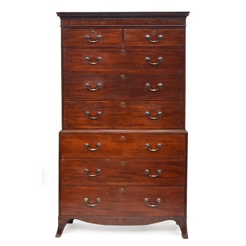 572 - A Regency mahogany chest on chest, dentil cornice over two short and three graduating shelves, the b... 