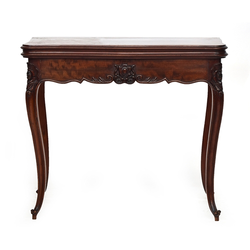 607 - A French mahogany card table, pull out action, foldover shaped top with green baize lining, carved a... 