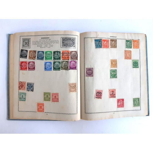 115 - A Triumph stamp album to include stamps from Great Britain, India, Hong Kong, Canada, Belgium, Austr... 