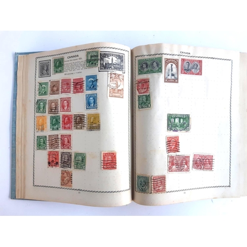 115 - A Triumph stamp album to include stamps from Great Britain, India, Hong Kong, Canada, Belgium, Austr... 