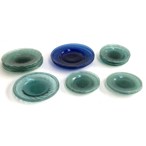 70 - A set of 21 hand blown art glass plates, the largest 23cmD, the smallest 15cmD