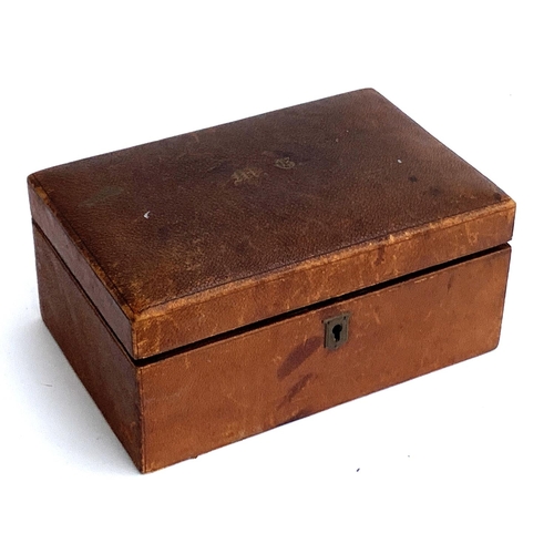 145 - An early 20th century leather jewellery box with remove-able tray, 23cmW