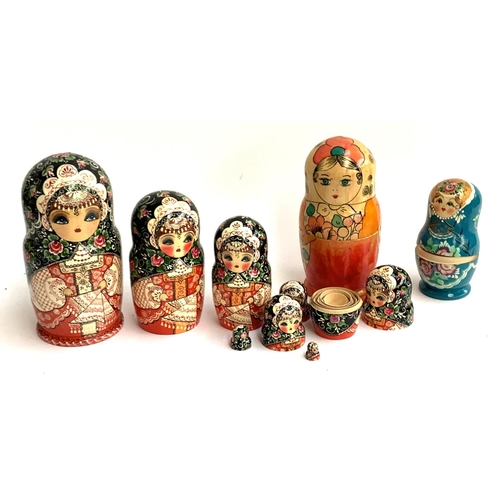 82 - Three sets of Russian nesting matryoshka dolls, the tallest 24.5cmH