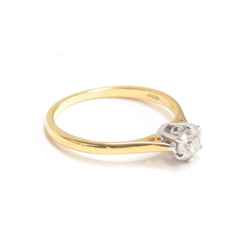 41A - An 18ct gold and diamond solitaire ring, with platinum claws, the diamond approx. 0.65cts, hallmarke... 