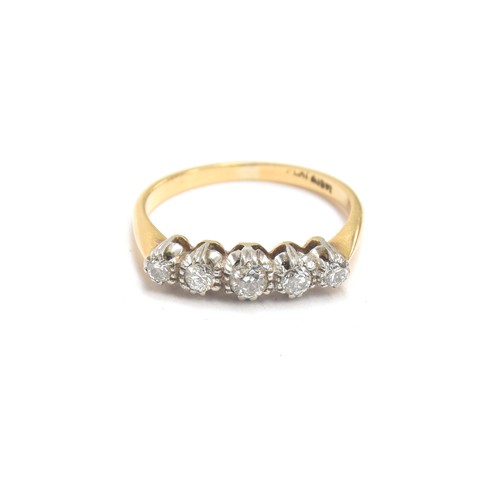 34A - An 18ct gold and platinum five stone diamond ring, the largest central diamond approx. 0.15ct, size ... 