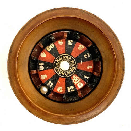 113 - A 19th century treen roulette wheel box and cover, inscribed and dated 1934, 5.5cmH