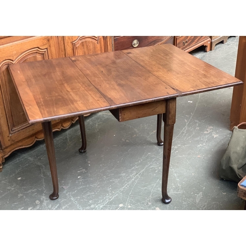 603 - A George II mahogany rectangular drop leaf table, moulded top with turned legs and pad feet (repairs... 