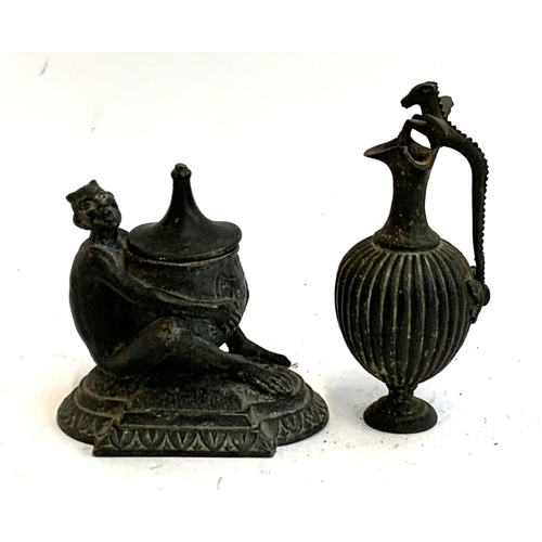 401 - A bronze ewer with stylised dragon handle, 15cmH; together with a lidded pot in the form of a devil ... 