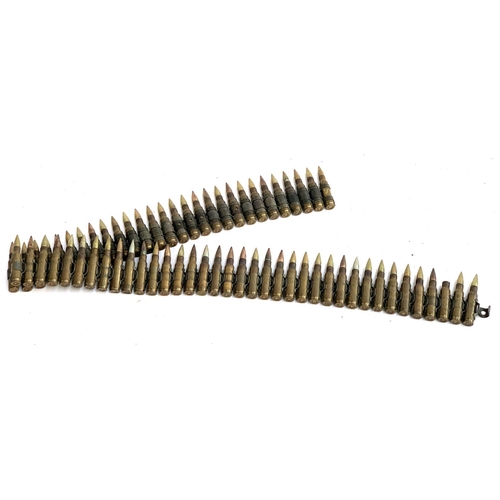 410 - A belt of inert machine gun ammunition, 97cmL