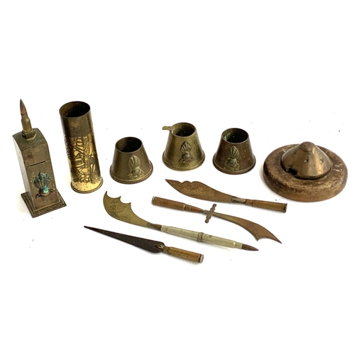 411 - A collection of trench art items, to include Ypres, 'Rouen Christmas 1917' letter openers, butterfly... 