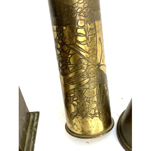 411 - A collection of trench art items, to include Ypres, 'Rouen Christmas 1917' letter openers, butterfly... 