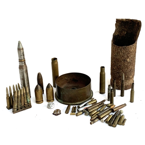 412 - A collection of ammunition shells to include early pre-war tank piercing bullets; Japanese machine g... 