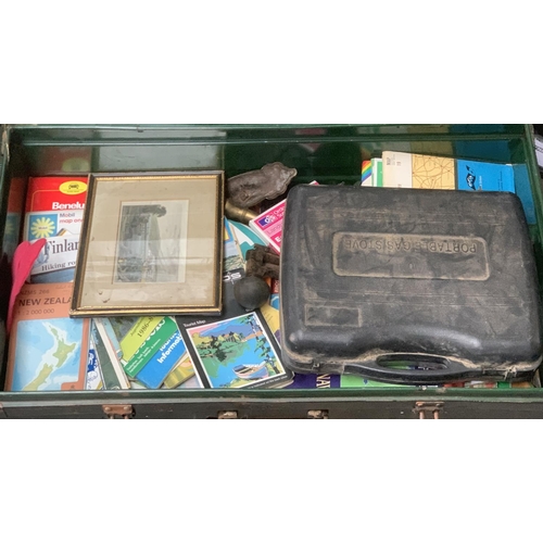 738 - A black painted tin travel trunk, with contents, 81cmW