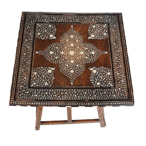 783 - A Middle Eastern hardwood square occasional table inlaid with bone and brass leaf designs 49cm high,... 