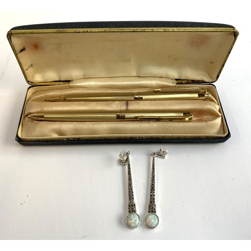 413A - A case set comprising gold plated pen and propelling pencil, together with a pair of 925 silver earr... 