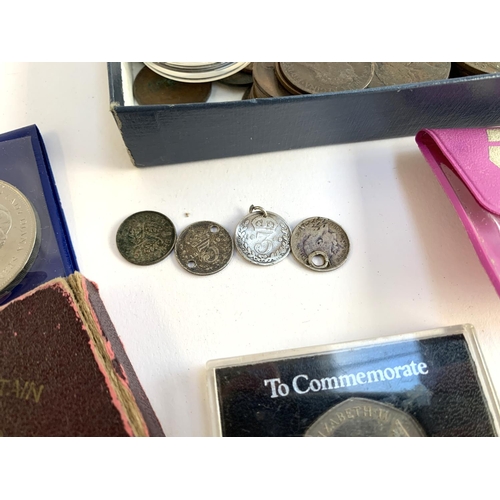 41 - A quantity of British and world coins to include pre 1947 silver, 1879 penny, commemorative coins, S... 