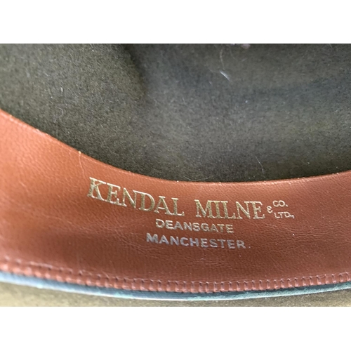 429 - A Kendal Milne & Co olive felt racing trilby, size 7