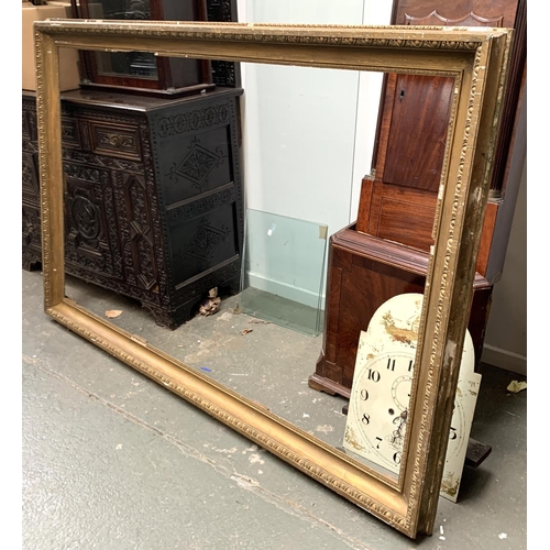 827 - A very large gilt gesso picture frame, in need of restoration