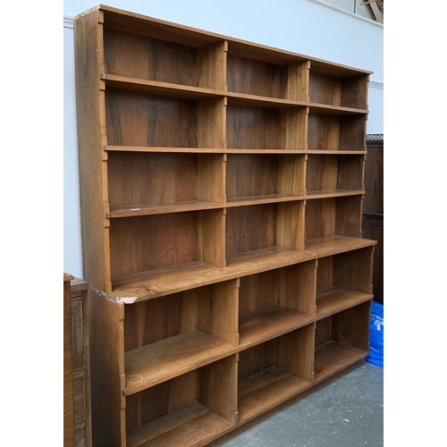 830 - An Eastern hardwood bookcase, 196x34x198