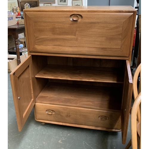 846 - An Ercol drinks cabinet on casters, 72.5x45x110cmH